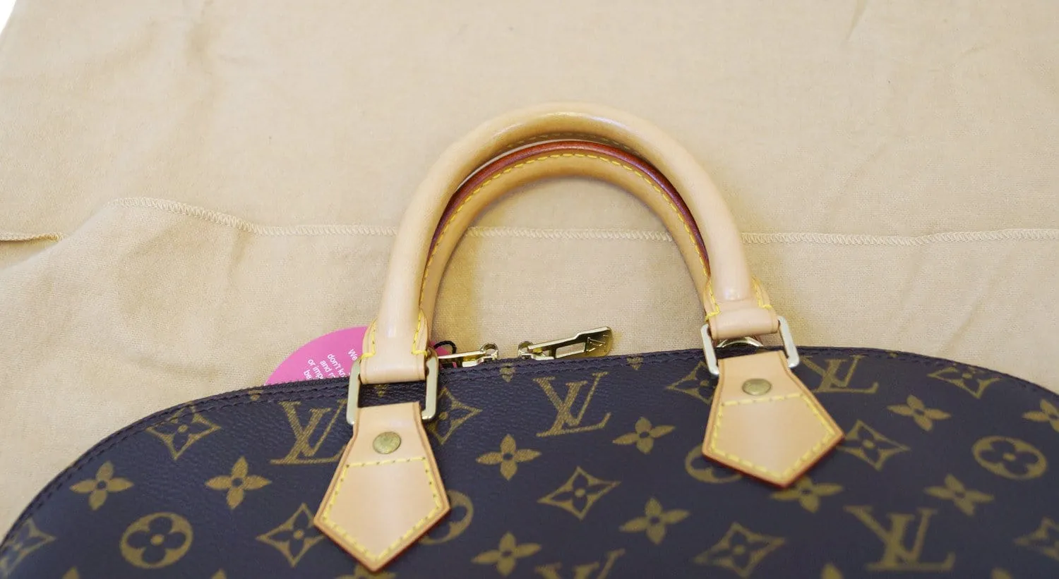 LOUIS VUITTON Monogram Canvas Alma Brown Handbag