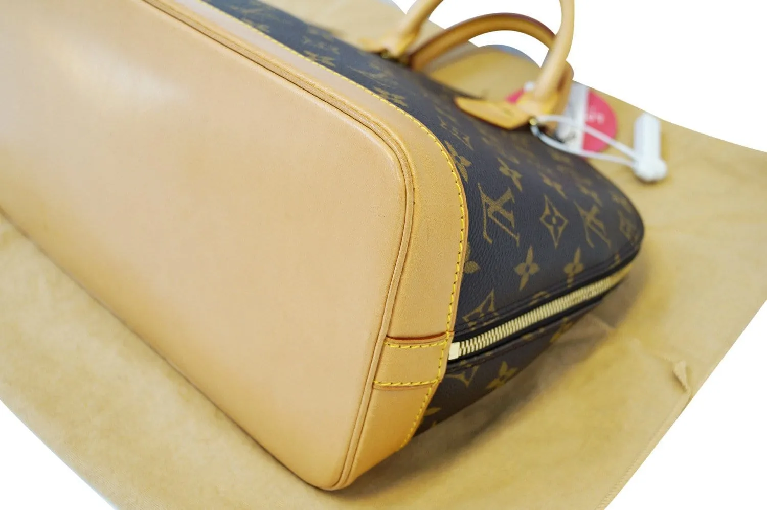 LOUIS VUITTON Monogram Canvas Alma Brown Handbag