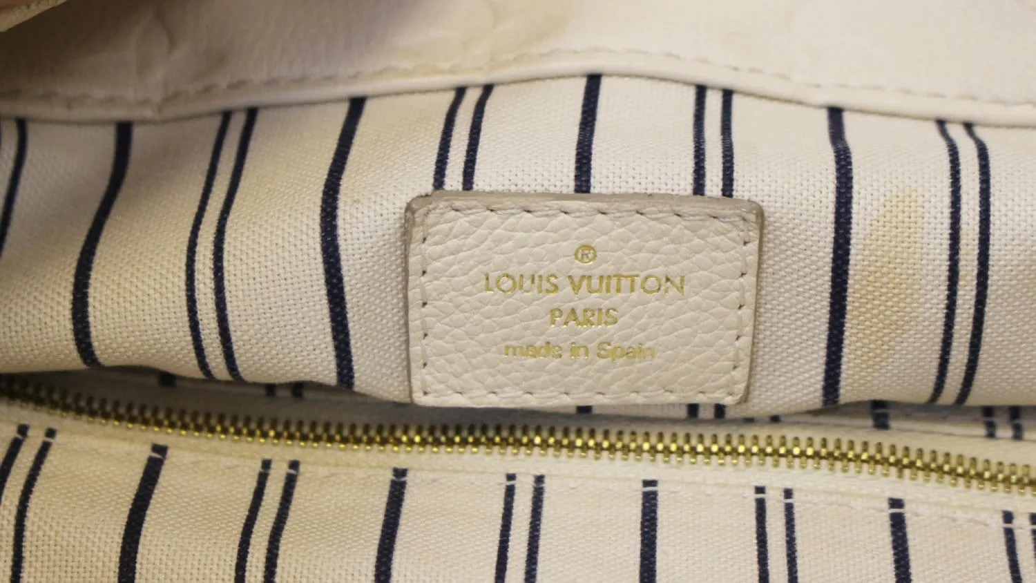 LOUIS VUITTON Monogram Empreinte Leather Artsy MM Neige Shoulder Bag