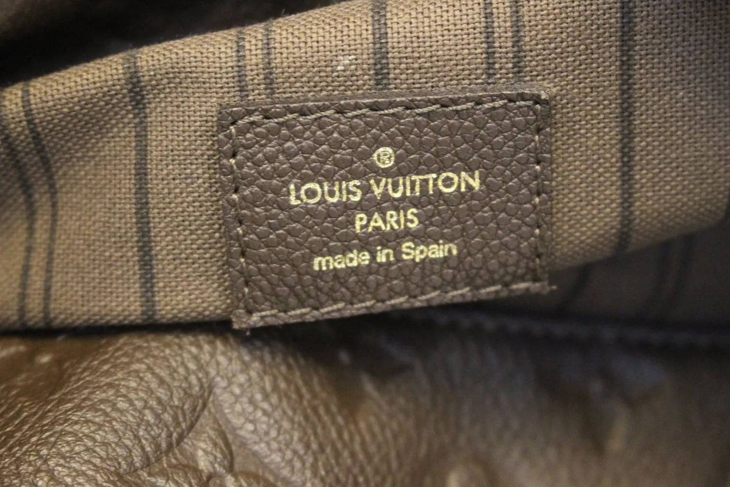 LOUIS VUITTON Terre Monogram Empreinte Leather Artsy MM Shoulder Bag