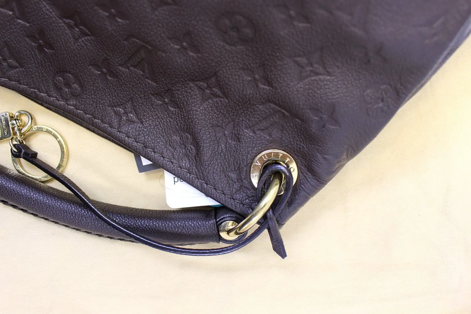 LOUIS VUITTON Terre Monogram Empreinte Leather Artsy MM Shoulder Bag