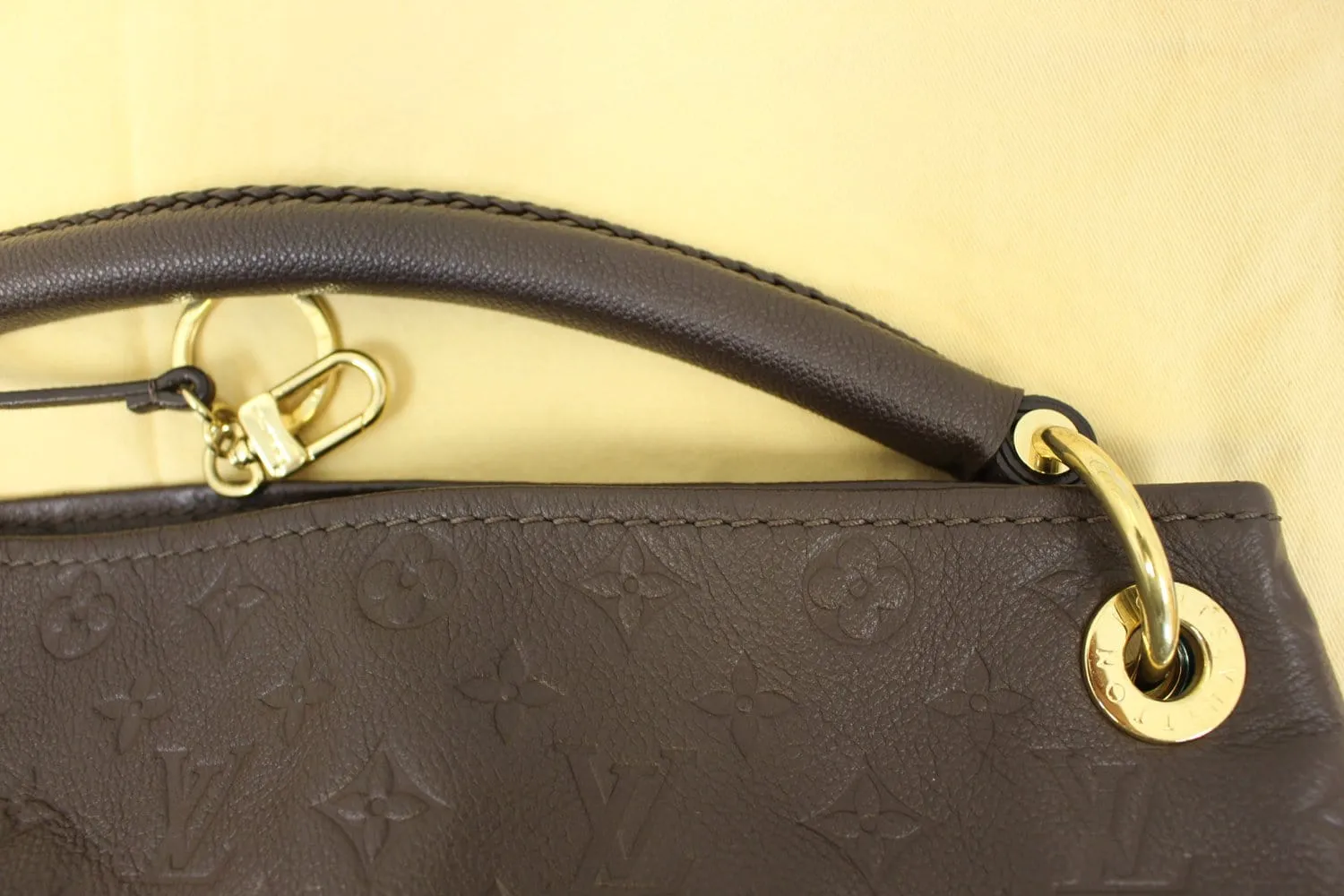 LOUIS VUITTON Terre Monogram Empreinte Leather Artsy MM Shoulder Bag