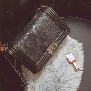 snakeskin clutch purse