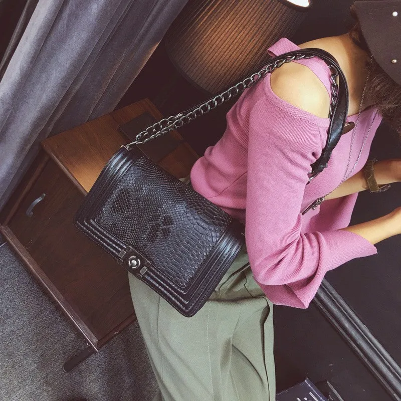 snakeskin clutch purse